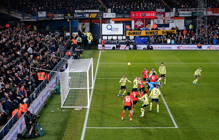 Elijah Adebayo pictured (no.11) scoring for Luton Town against Arsenal during a Premier League game in December 2023